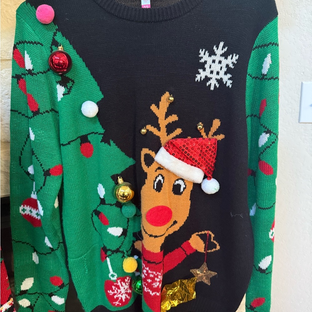 No Boundaries Festive Reindeer Sweater in Green and Black